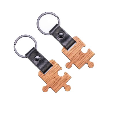 Obrazek dla: Drewniane Breloki Leather Puzzel Duet  2szt. Merbau  Czarny