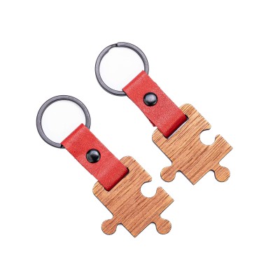 Obrazek dla: Drewniane Breloki Leather Puzzel Duet  2szt. Merbau  Czerwony